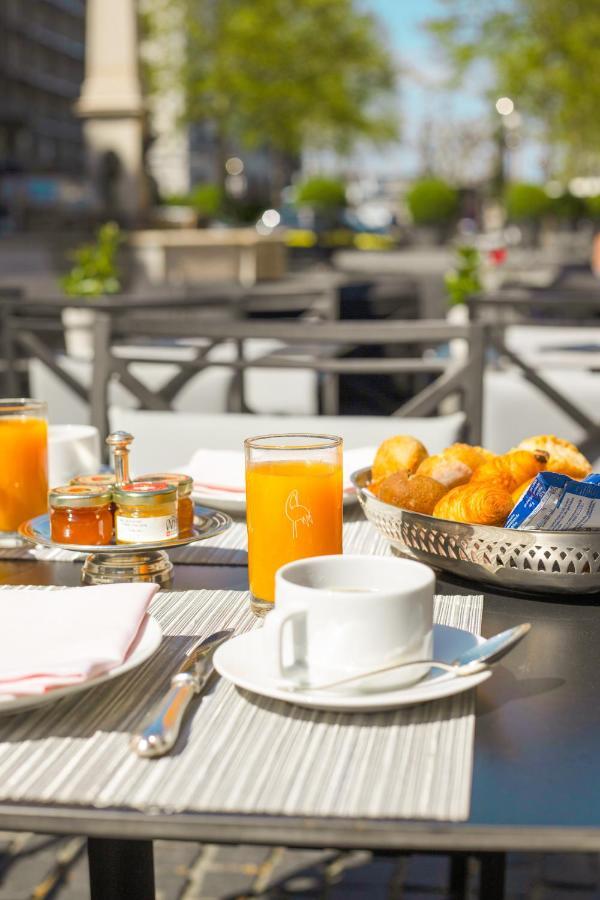 Hotel De La Cigogne Geneva Ngoại thất bức ảnh Breakfast at the hotel