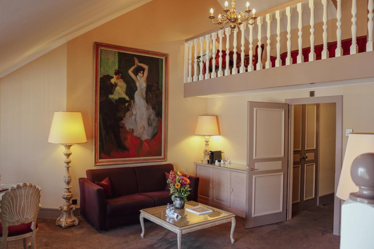 Hotel De La Cigogne Geneva Ngoại thất bức ảnh A suite at the Hotel de l'Europe